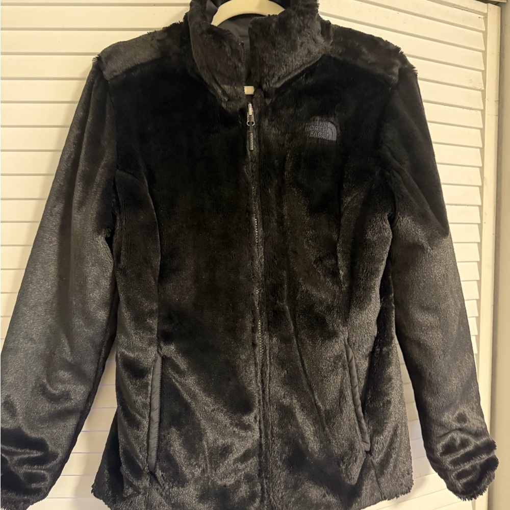 The North Face Women's reversible jacket. Fleece on one side, puffer on other